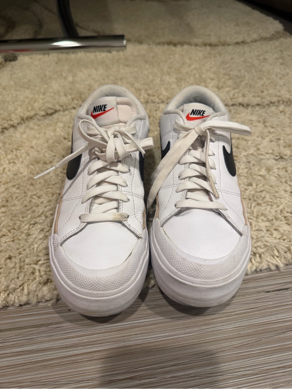 Nike Men’s White Sneakers with Black Swoosh